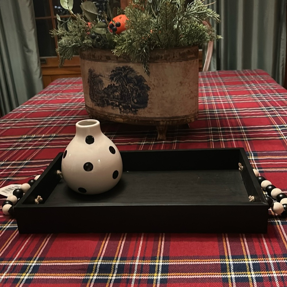 Black wooden tray with beaded handle & black white polka dotted vase.